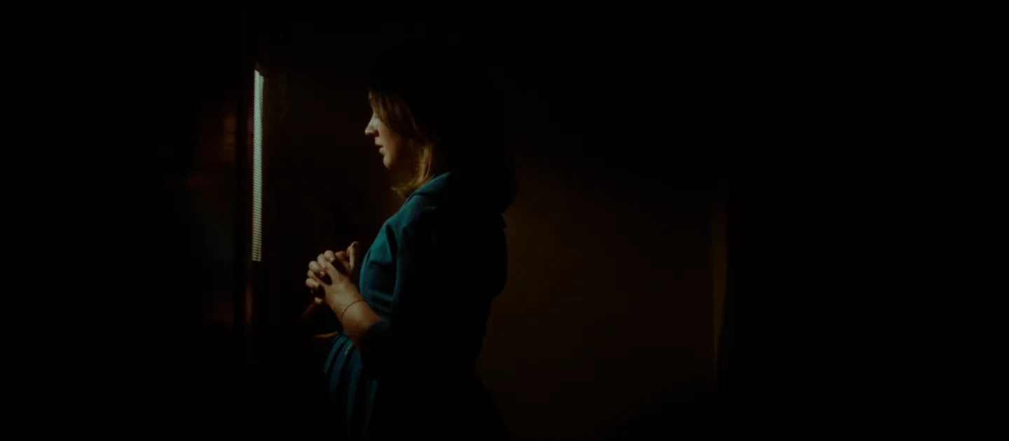 TESTIMONY main image, pregnant woman looking away