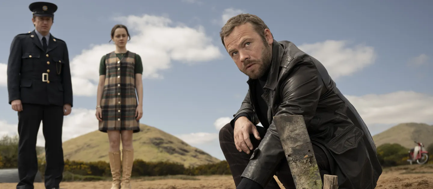 BAITE MAIN IMAGE - man kneeling near camera