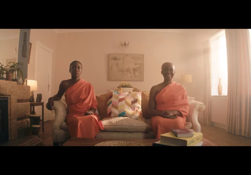 NAY DAY image, main character and her mother sitting on couch